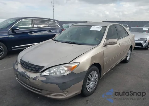 2004 Toyota Camry Le z USA, uszkodzony, nr VIN 4T1BE32K94U854215